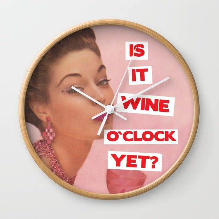 <i>Wine O'Clock Wall Clock, <a href="https://society6.com/product/wine-oclock-6on_wall-clock#33=282&amp;34=285" target="_blank">$30</a></i>