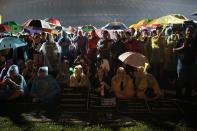 Supporters of the opposition party gather at a stadium in Kelana Jaya, Selangor on May 8, 2013. The rally was called by opposition leader Anwar Ibrahim, who has vowed a "fierce" campaign for electoral reform after losing Sunday's vote and has said he would soon produce evidence of fraud by what he calls an "illegitimate" government