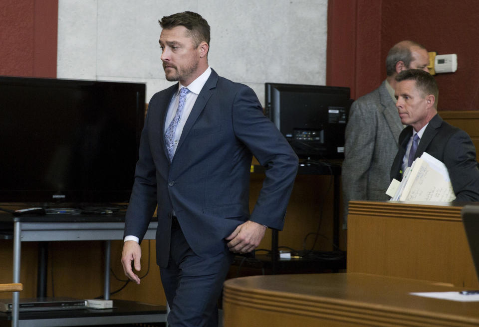 Reality TV star Chris Soules, of "The Bachelor," left, arrives in the courtroom for his sentencing on leaving-the-scene charges, Tuesday, May 21, 2019, in Independence, Iowa. (Kelly Wenzel/The Courier via AP, Pool)