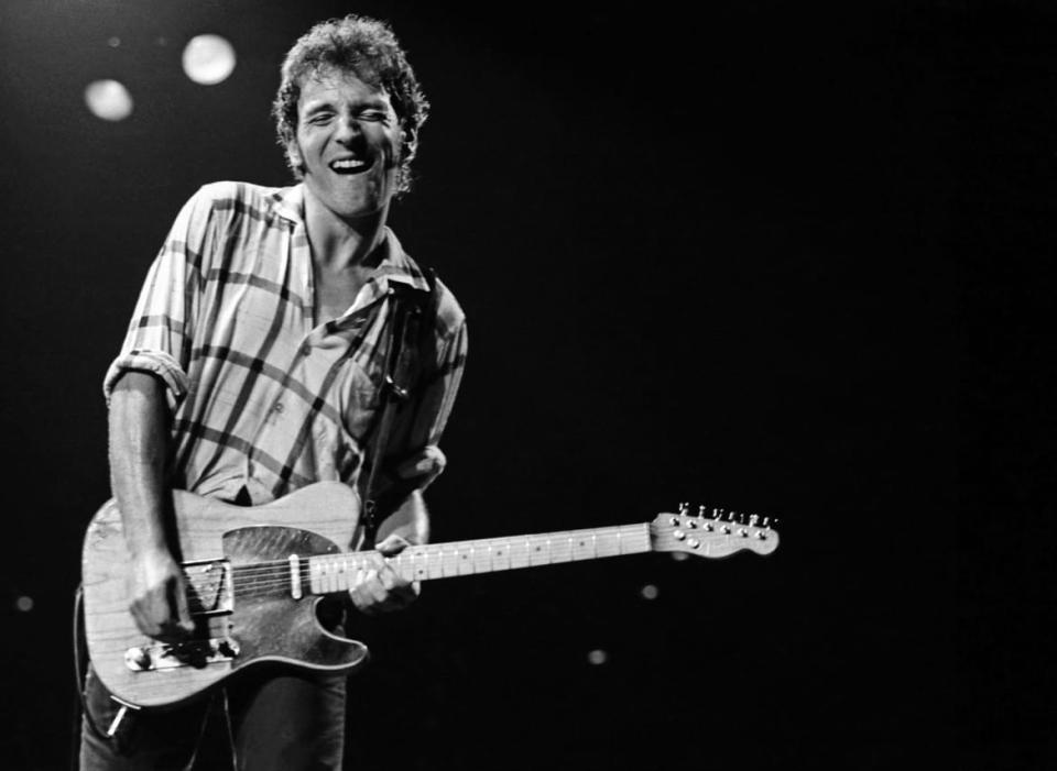 <div class="inline-image__caption"><p>Bruce Springsteen on stage with his E Street Band at the Richfield Coliseum in Ohio, USA, on October 6, 1980.</p></div> <div class="inline-image__credit">Janet Macoska</div>