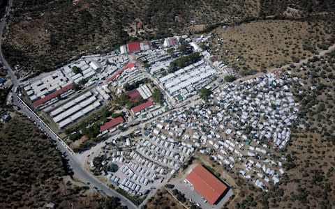 An aerial view of Moria refugee camp on Lesbos - Credit: Michael Varaklas/AP