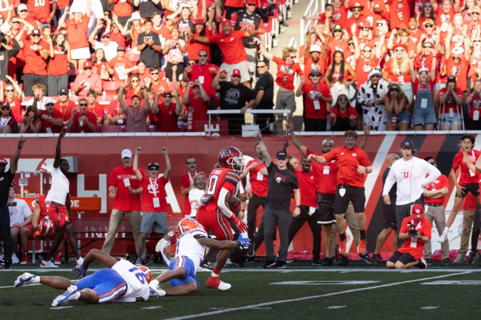 Utah Utes wide receiver Money Parks (10) breaks away and scores a touchdown on a catch from Utah Utes quarterback Bryson Barnes (16) during the first quarter of their season opener against Florida at Rice-Eccles Stadium in Salt Lake City on Thursday, Aug. 31, 2023. | Megan Nielsen, Deseret News