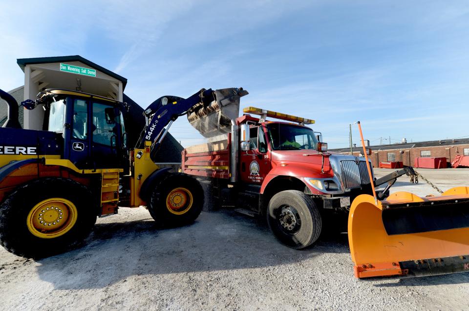 A dump truck gets loaded with salt at the salt dome at the Public Works Street Dept. Tuesday Dec. 20, 2022.