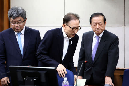 Former South Korean President Lee Myung-Bak appears for his first trial at the Seoul Central District Court on May 23, 2018 in Seoul, South Korea. Chung Sung-Jun/Pool via Reuters *** Local Caption *** Lee Myung-Bak