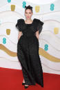 C'est avec cette robe que l'actrice Rooney Mara a accompagné son conjoint du moment Joaquin Phoenix aux BAFTA.