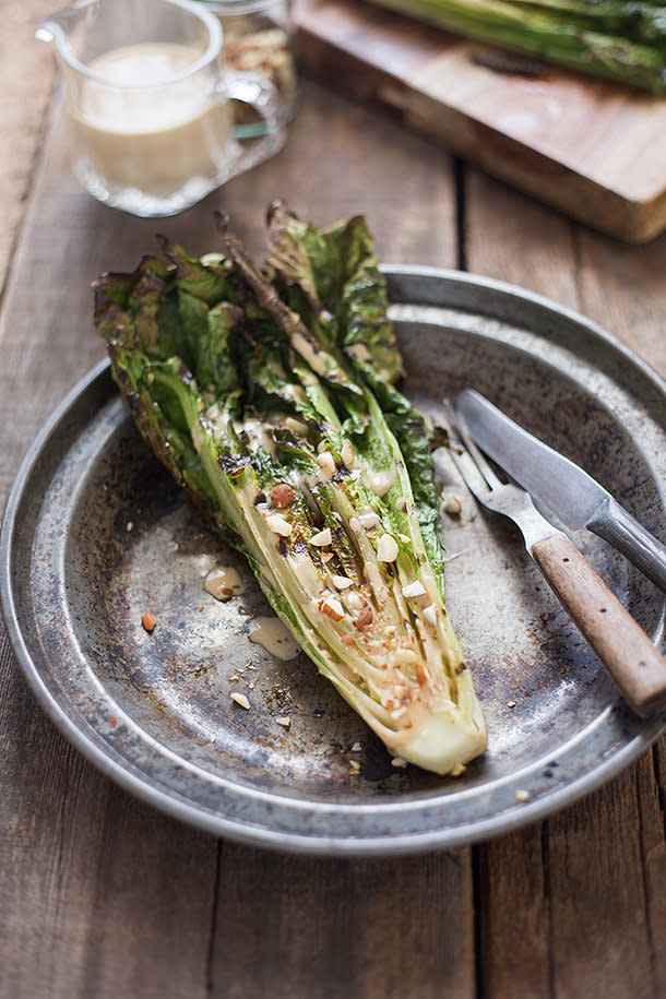 <strong>Get the <a href="http://slimpalate.com/grilled-romaine-with-toasted-almonds-and-caesar-dressing/" target="_blank">Grilled Romaine With Toasted Almonds recipe</a> from Slim Palate</strong>