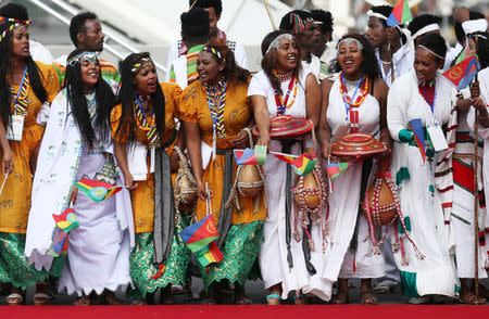 Ethiopian traditional dancers perform during the welcoming ceremony for Eritrea's President Isaias Afwerki, at the Bole international airport in Addis Ababa, Ethiopia July 14, 2018. REUTERS/Tiksa Negeri