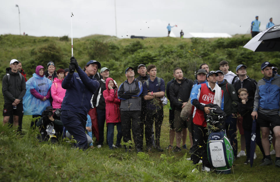 Phil Mickelson of the United States plays a shot from the rough on the 11th hole during the second round of the British Open Golf Championships at Royal Portrush in Northern Ireland, Friday, July 19, 2019.(AP Photo/Matt Dunham)