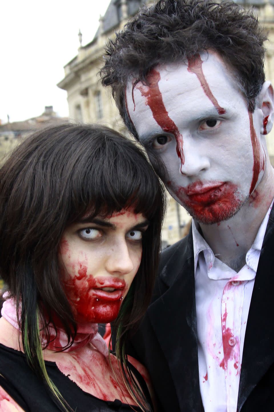 <p>Turn yourselves into <em>The Walking Dead</em> extras with a little makeup and lots of fake blood (which you can buy or <a href="https://www.goodhousekeeping.com/holidays/halloween-ideas/how-to/a35075/how-to-make-fake-blood/" rel="nofollow noopener" target="_blank" data-ylk="slk:make at home;elm:context_link;itc:0;sec:content-canvas" class="link ">make at home</a>). Then go the extra mile with colored contacts.</p><p><a class="link " href="https://www.amazon.com/dp/B06XC7TVGT/?tag=syn-yahoo-20&ascsubtag=%5Bartid%7C10055.g.2625%5Bsrc%7Cyahoo-us" rel="nofollow noopener" target="_blank" data-ylk="slk:SHOP FAKE BLOOD;elm:context_link;itc:0;sec:content-canvas">SHOP FAKE BLOOD</a></p>