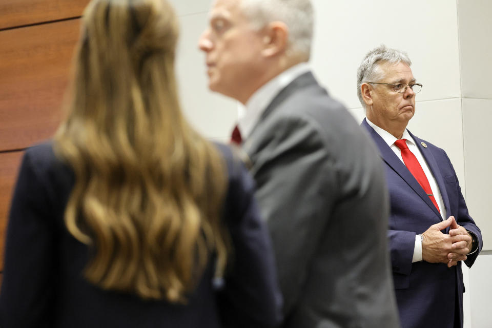 Former Marjory Stoneman Douglas High School School Resource Officer Scot Peterson, right, is shown prior to opening statements in his trial at the Broward County Courthouse in Fort Lauderdale on Wednesday, June 7, 2023. Assistant State Attorneys Kristen Gomes and Steven Klinger are shown at left. (Amy Beth Bennett/South Florida Sun-Sentinel via AP, Pool)