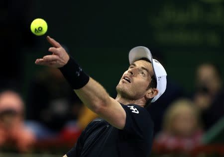 Tennis - Qatar Open - Men's Singles - Andy Murray of Britain v Nicolas Almagro of Spain - Doha, Qatar - 5/1/2017 - Murray serves the ball. REUTERS/Ibraheem Al Omari