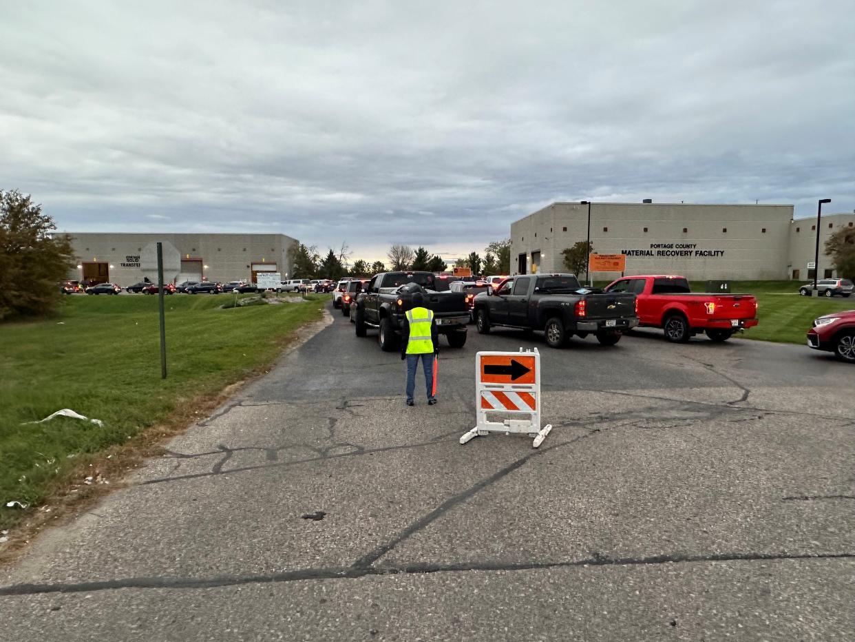 A line of cars waits to enter the Portage County Transfer Facility in Plover Oct. 12 to offload their items during an electronics recycling event.