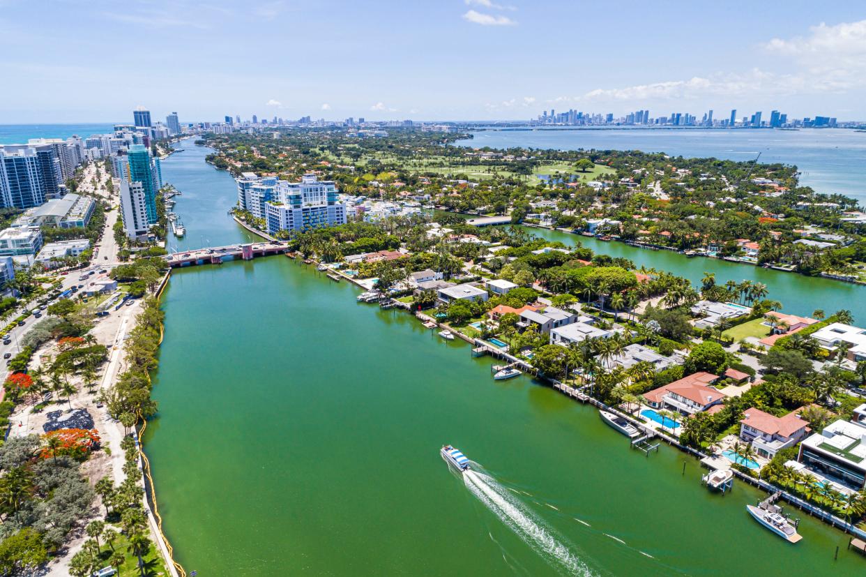 Miami Beach, Florida, aerial view, Indian Creek Biscayne Bay Allison Island La Gorce Island city skyline.