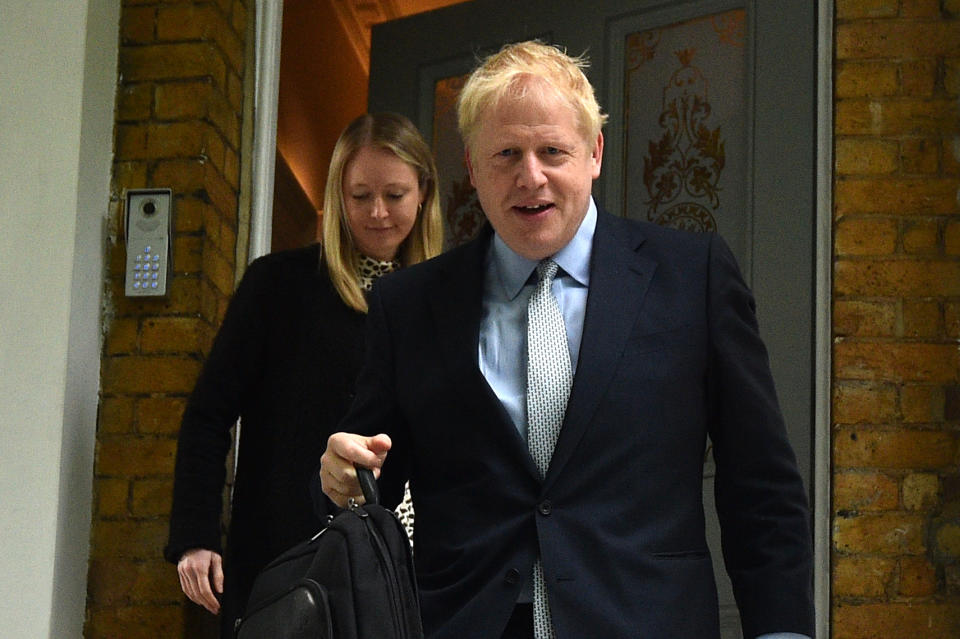 TOPSHOT - Conservative MP Boris Johnson leaves his home in London on June 13, 2019. - The 10 candidates running to replace Britain's outgoing Prime Minister Theresa May face the first round of voting on Thursday -- when at least one will get the chop. (Photo by Glyn KIRK / AFP)        (Photo credit should read GLYN KIRK/AFP/Getty Images)