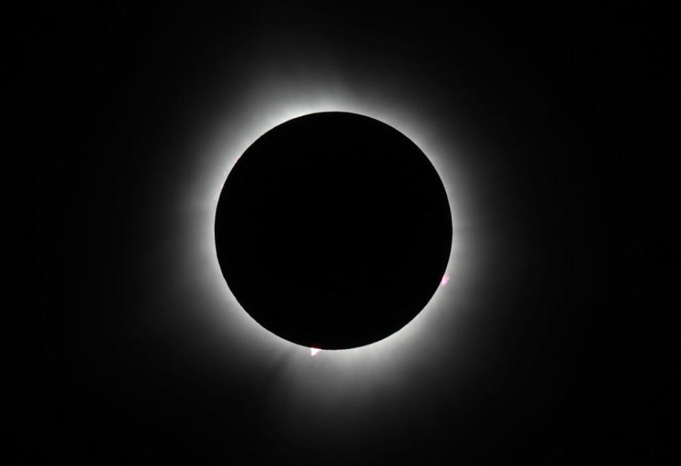 The sun reaches totality during the solar eclipse on April 8, 2024 in Houlton, Maine.  Millions of people have flocked to areas of North America that are in the 