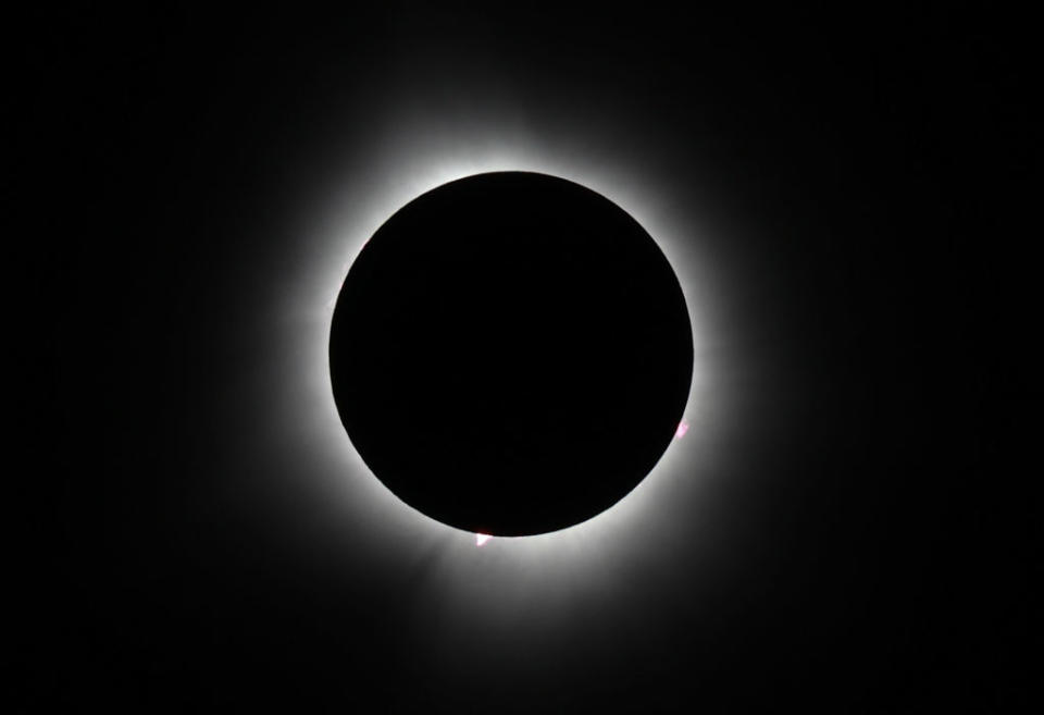 The Sun reaches totality during the eclipse in Houlton, Maine, on April 08, 2024.  Millions of people flocked to areas in North America. 