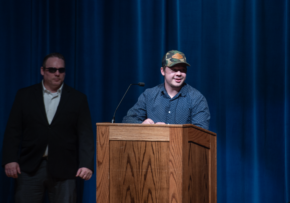 Kyle Rittenhouse speaks to the nearly full auditorium at Kent State University's student center on Tuesday.