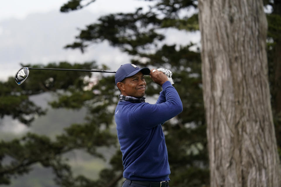 Tiger Woods watches his tee shot on the 14th hole during the first round of the PGA Championship golf tournament at TPC Harding Park Thursday, Aug. 6, 2020, in San Francisco. (AP Photo/Jeff Chiu)