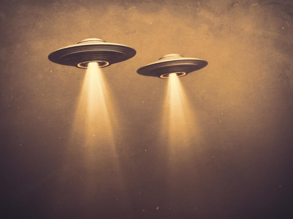 Unidentified flying objects (UFOs), illustration.