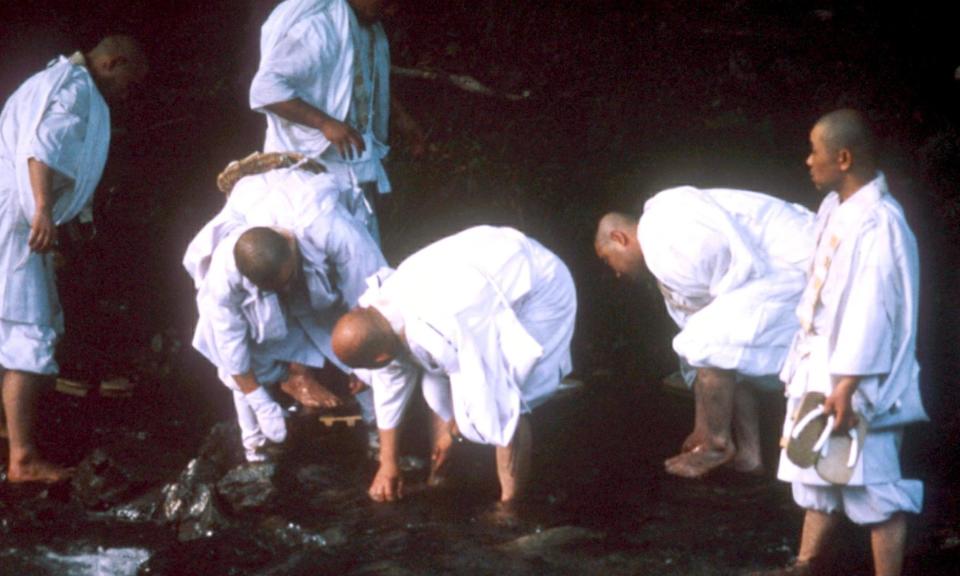 <span>The ‘marathon monks’ of Mount Hiei in Japan.</span><span>Photograph: M Yorke/Rex Features</span>