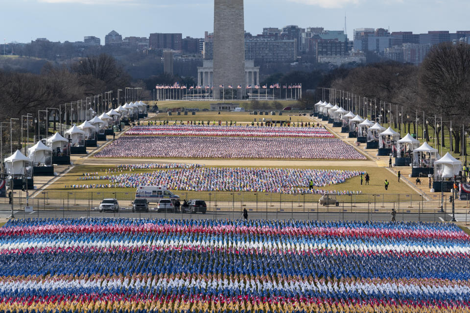 Flags are placed on the National Mall, looking towards the Washington Monument, and the Lincoln Memorial, ahead of the inauguration of President-elect Joe Biden and Vice President-elect Kamala Harris, Monday, Jan. 18, 2021, in Washington. (AP Photo/Alex Brandon)