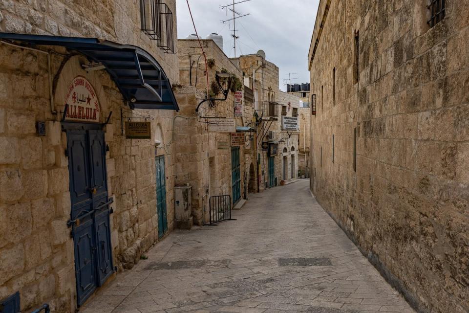 Some of the shuttered shops in Bethlehem (Bel Trew/The Independent)