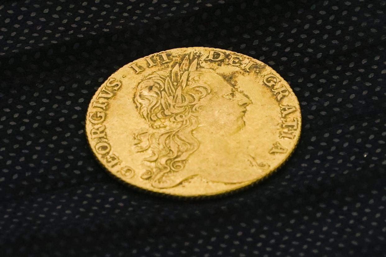 Shown is a King George III gold guinea, discovered in an excavation site at the Red Bank Battlefield Park in National Park, N.J.