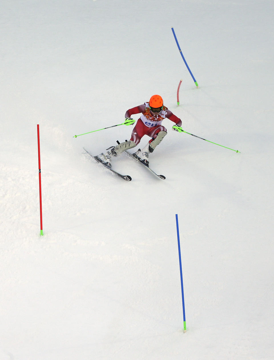 Gold medalist Switzerland's Sandro Viletta competed in the slalom portion of the men's supercombined at the 2014 Winter Olympics, Friday, Feb. 14, 2014, in Krasnaya Polyana, Russia. (AP Photo/Charlie Riedel)