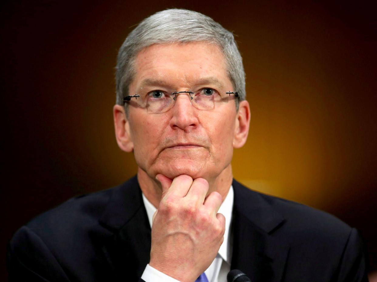 apple ceo tim cook pensive