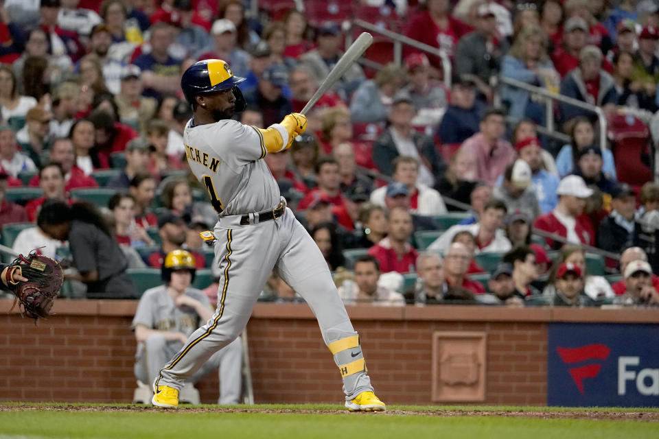 Milwaukee Brewers' Andrew McCutchen follows through on an RBI single during the fourth inning of a baseball game against the St. Louis Cardinals Thursday, May 26, 2022, in St. Louis. (AP Photo/Jeff Roberson)