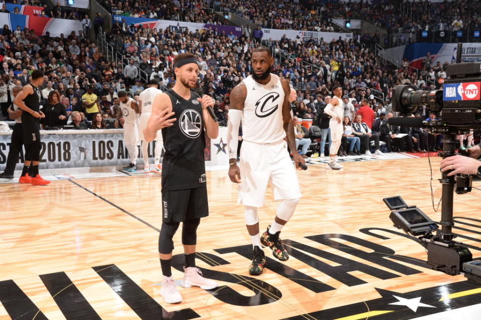 Stephen Curry and LeBron James address the crowd at the 2018 NBA All-Star Game. (Getty Images)ry
