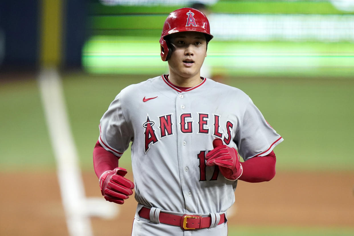 Los Angeles Angels' Shohei Ohtani scores during the seventh inning of a baseball game against the Miami Marlins, Wednesday, July 6, 2022, in Miami. The Angels won 5-2. (AP Photo/Lynne Sladky)