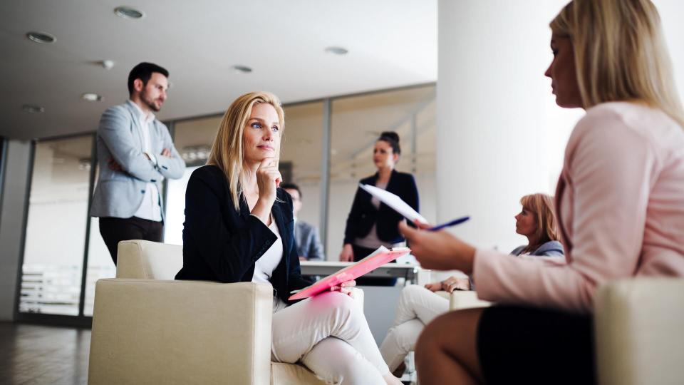 Picture of sales agents working together in company office.