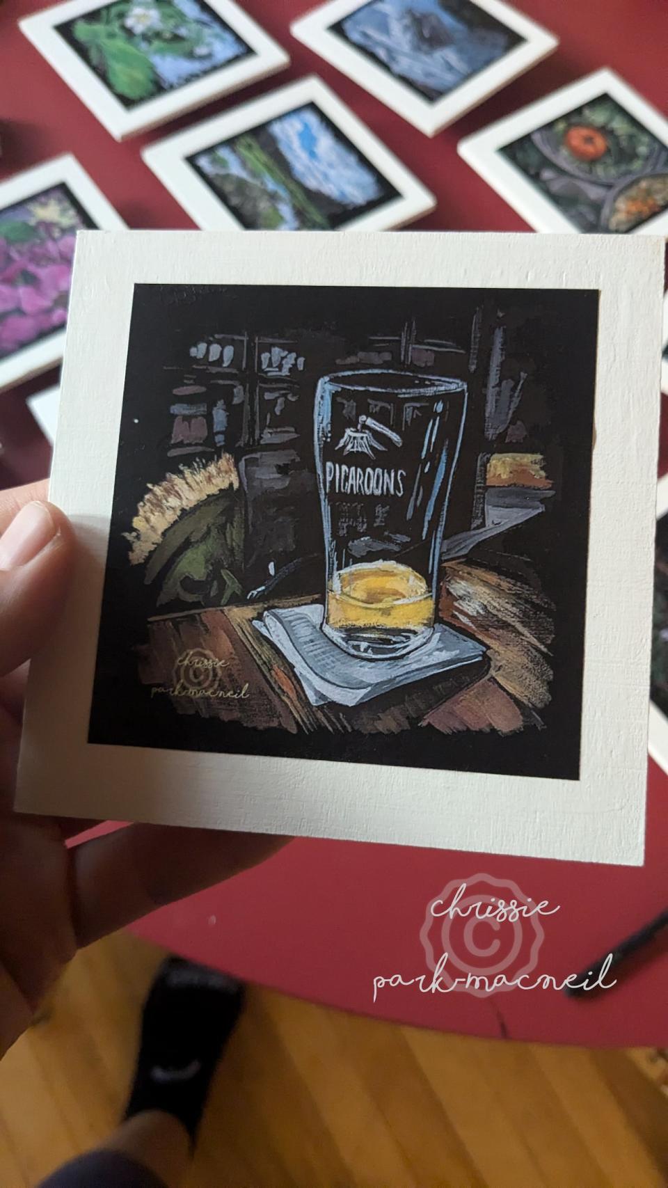 Some of the art pieces that will be hidden on Saturday include elements that will be familiar to Fredericton residents, such as this piece by Chrissie Park-MacNeil showing a mostly empty Picaroons glass. 