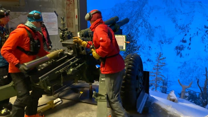 <span class="article__caption">Watching ski patrol shoot avalanches in the canyon. </span> (Photo: Dan Schilling)