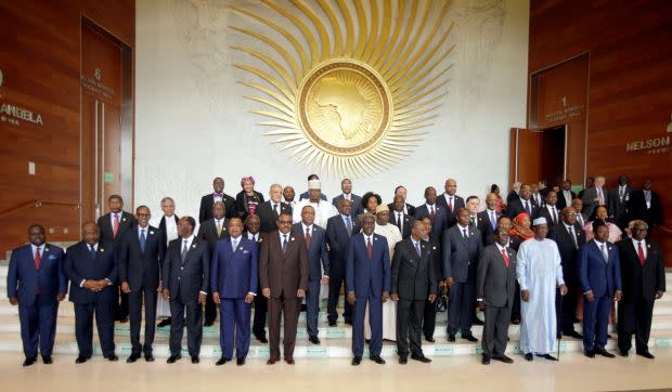 African heads of states and governments pose for a group photo during the opening ceremony of the 29th Ordinary Session of the Assembly of the Heads of State and the Governments in Addis Ababa, Ethiopia. Most of them are male and wearing suits with only a handful of women in the picture.