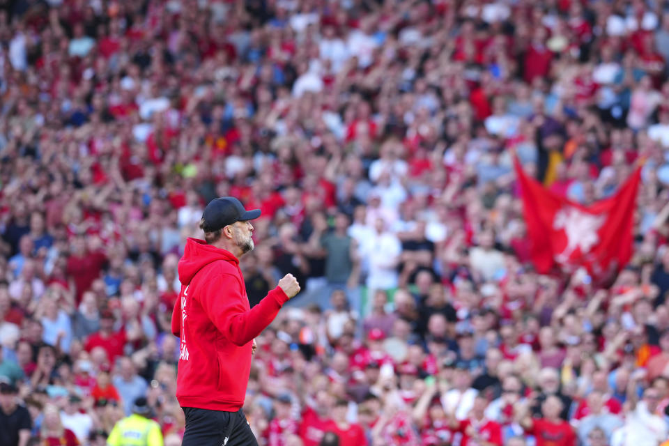 Liverpool's manager Jurgen Klopp reacts to fans after the English Premier League soccer match between Liverpool and Wolverhampton Wanderers at Anfield Stadium in Liverpool, England, Sunday, May 19, 2024. (AP Photo/Jon Super)