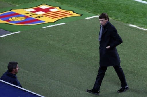 El entrenador del FC Barcelona, Tito Vilanova (foto), afirmó el sábado 18 de mayo de 2013 que el equipo, después de haber asegurado el pasado fin de semana su 22º título de la Liga española, tiene ahora como misión acabar con 100 puntos. (AFP | Quique García)