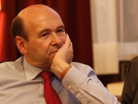 Vienna State Opera director Dominique Meyer listens during a Reuters interview in his office in Vienna October 1, 2014. REUTERS/Leonhard Foeger