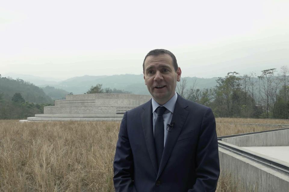 In this image from a video, Alexandre Ricard, chairman and CEO of Pernod Ricard speaks at the Chuan Malt Distillery in Emeishan in southwestern China's Sichuan province on Dec. 12, 2023. The more than $100 million distillery owned by Pernod Ricard and based at the UNESCO World Heritage site Mount Emei, launched a pure-malt whisky, The Chuan, aiming to tap a growing taste among young Chinese for whisky in place of the traditional "baijiu" used to toast festive occasions. (AP Photo/Caroline Chen)