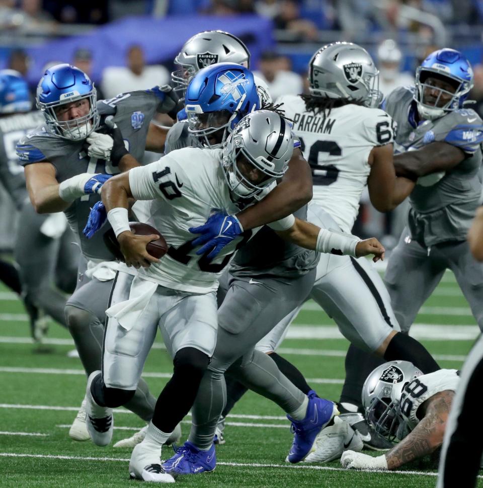 Detroit Lions defensive tackle Alim McNeill (54) sacks Las Vegas Raiders quarterback Jimmy Garoppolo (10) during second half action Monday, Oct 30, 2023.