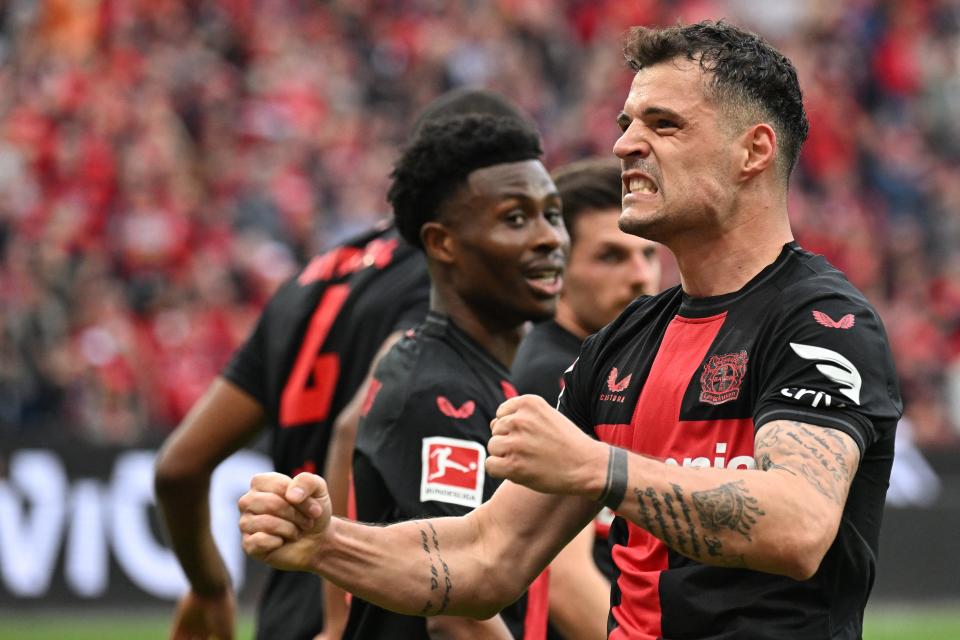 Granit Xhaka celebrates after scoring a goal in Bayer Leverkusen's win over Werder Breman on April 14, 2024.