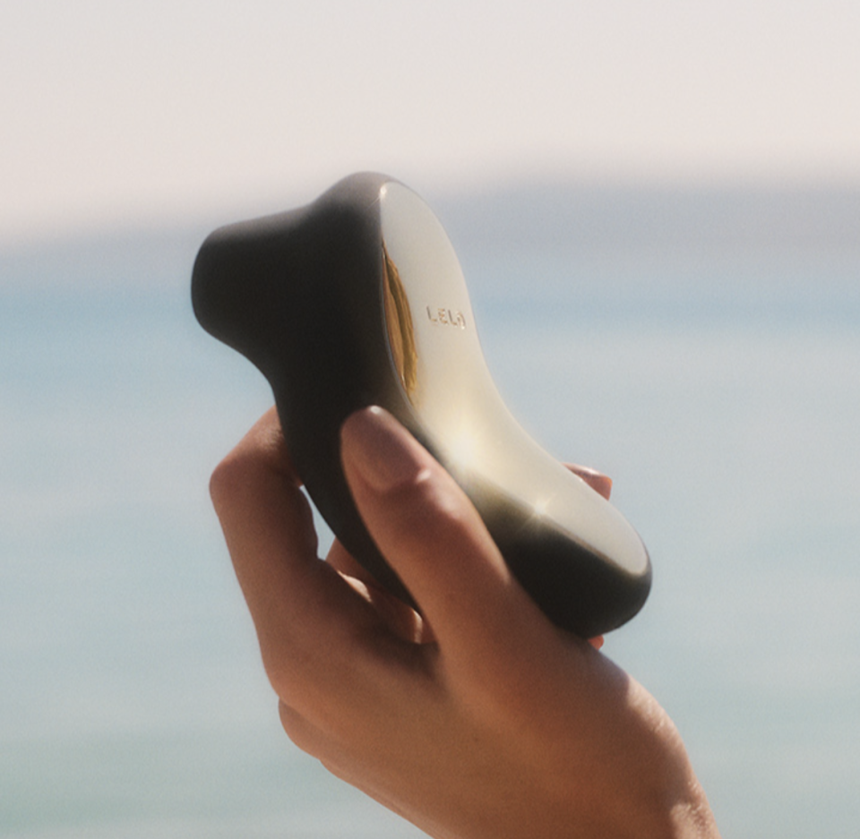 hand holding black sex toy, Lelo Sona Cruise (Photo via Lelo)