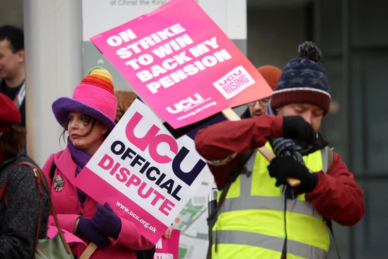 FILE PHOTO: University of Liverpool staff and students attend a rally, during a day of strike action, in Liverpool