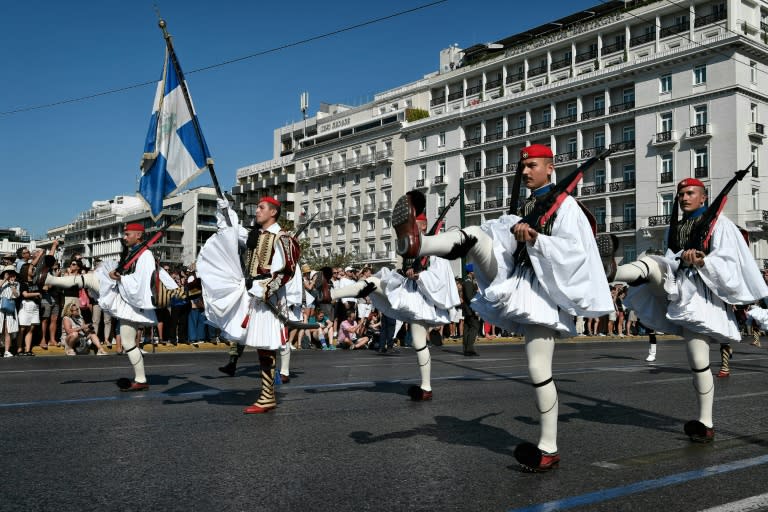 The evzones march during the change of the guard in Athens