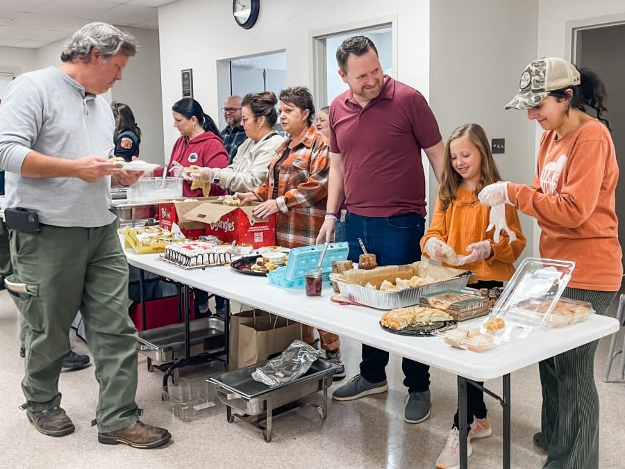 Chad Tucker, family serve Thanksgiving meals to firefighters at Sauratown Mountain