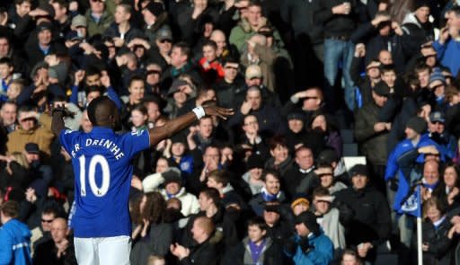 Everton's midfielder Royston Drenthe celebrates scoring during their English FA Cup 5th Round football match against Blackpool at Goodison Park in Liverpool. Everton won 2-0