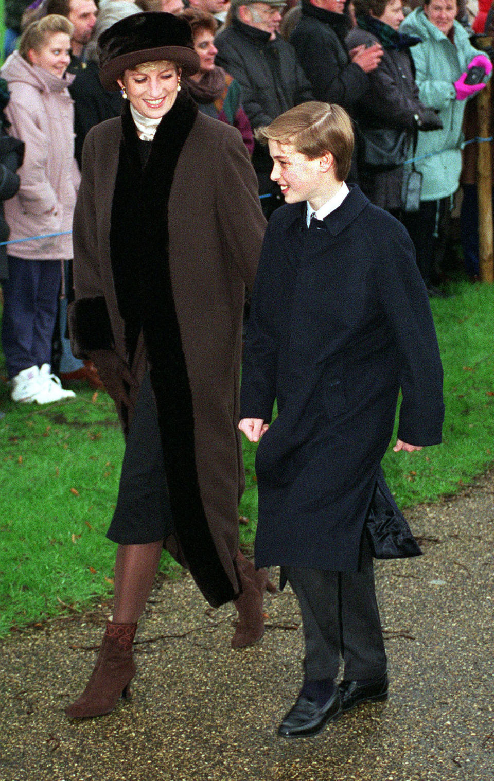 Princess Diana (1961 - 1997) on her way to Sandringham Church with Prince William for a Christmas Day service, 25th December 1994. (Terry Fincher / Getty Images)
