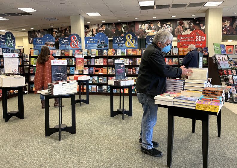 Customers shop for books at a Barnes and Noble store in Corte Madera, California.