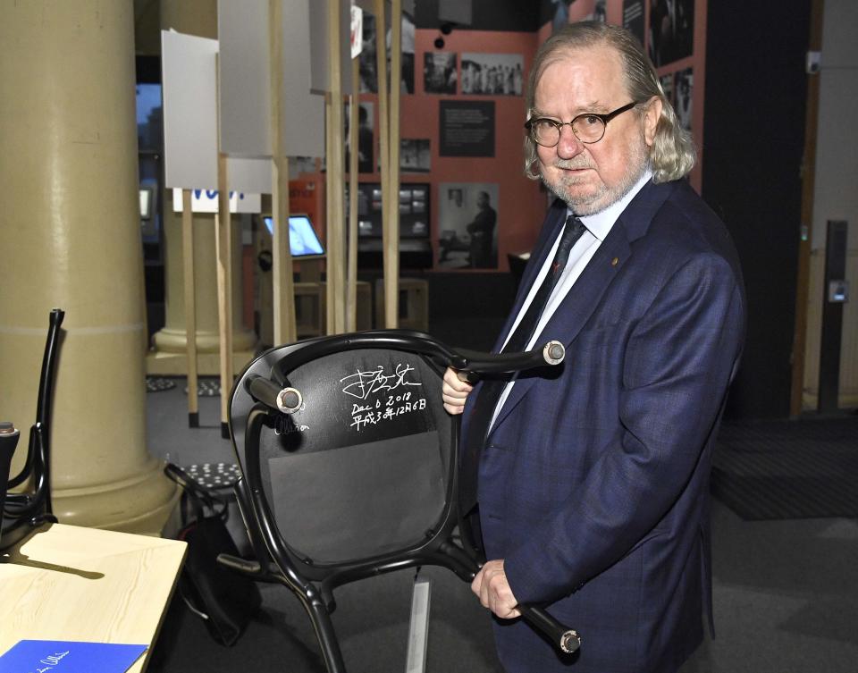 The 2018 Nobel Physiology or Medicine laureate, Professor James P. Allison poses during the traditional Nobel Chair Signing ceremony at the Nobel Museum in Stockholm, Sweden, on Thursday Dec. 6, 2018. (Claudio Bresciani/TT via AP)